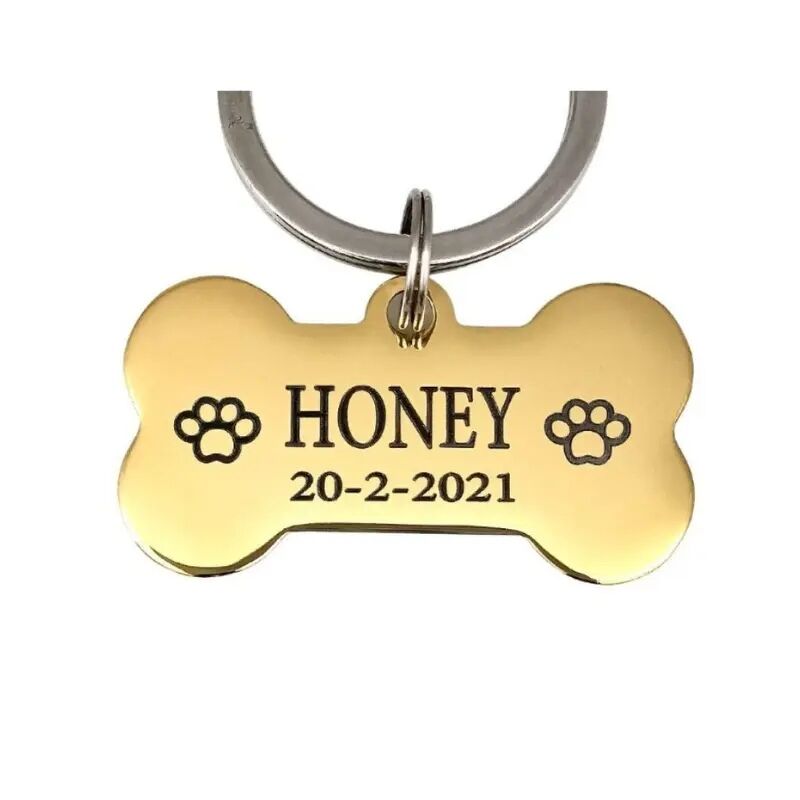 Hondenpenning bot gegraveerd voor hond met naam adres en telefoonnummer goud